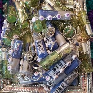 Three  Bon Bons lip gloss keychain.